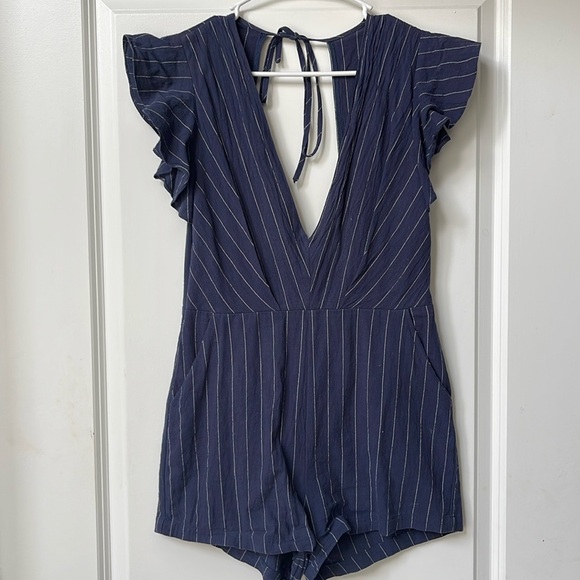 Navy Blue Striped Romper with Open Back and Ruffled Sleeves - Picture 1 of 2
